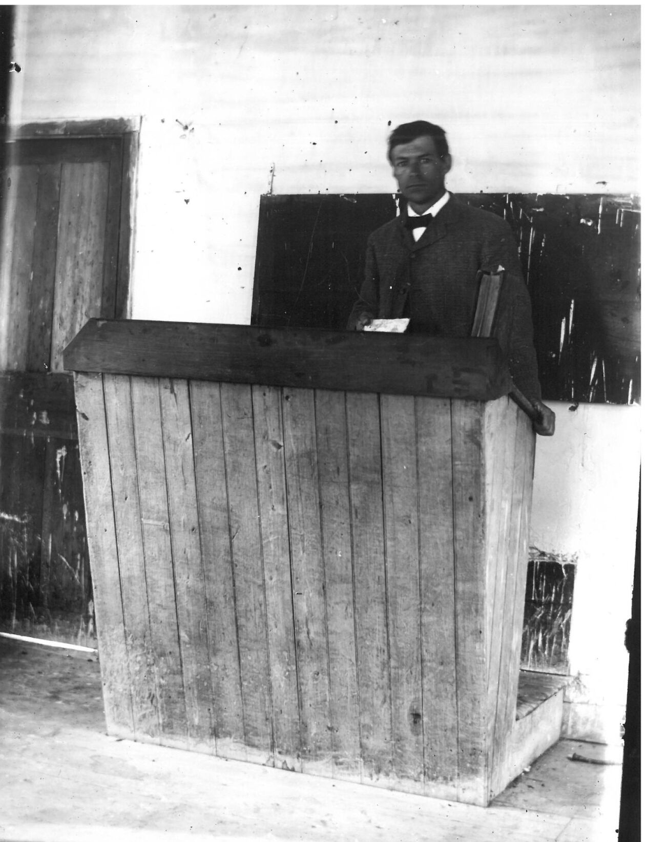 Teacher at His Desk